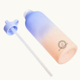 Tritan Water Bottle in Light Blue & Peach, drinking straw extended, showing logo placement