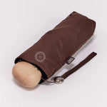 Ultra Compact Mini Umbrella in brown, in its carry bag