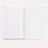 Undated Weekly Planner, open to the monthly priorities and notes layout