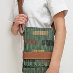 Handwoven upcycled messenger bag • Sustainable Corporate gifts with impact for clients and brand activations