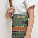 Handwoven upcycled messenger bag • Sustainable Corporate gifts with impact for clients and brand activations