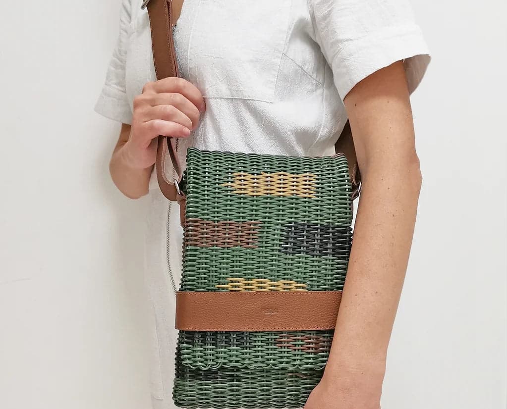 Handwoven upcycled messenger bag • Sustainable Corporate gifts with impact for clients and brand activations