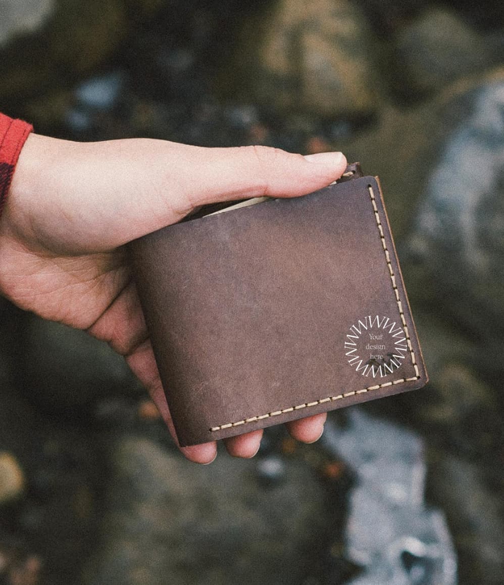Vintage brown leather wallet hand stitched by women artisans India personalised corporate gift UK