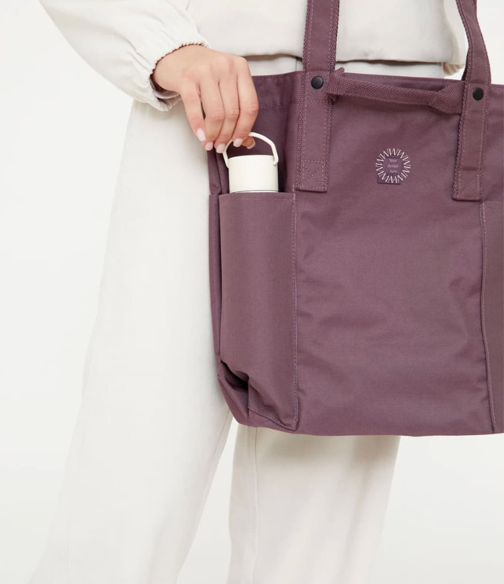 Water-Resistant Tote Bag, detail showing the water bottle pocket