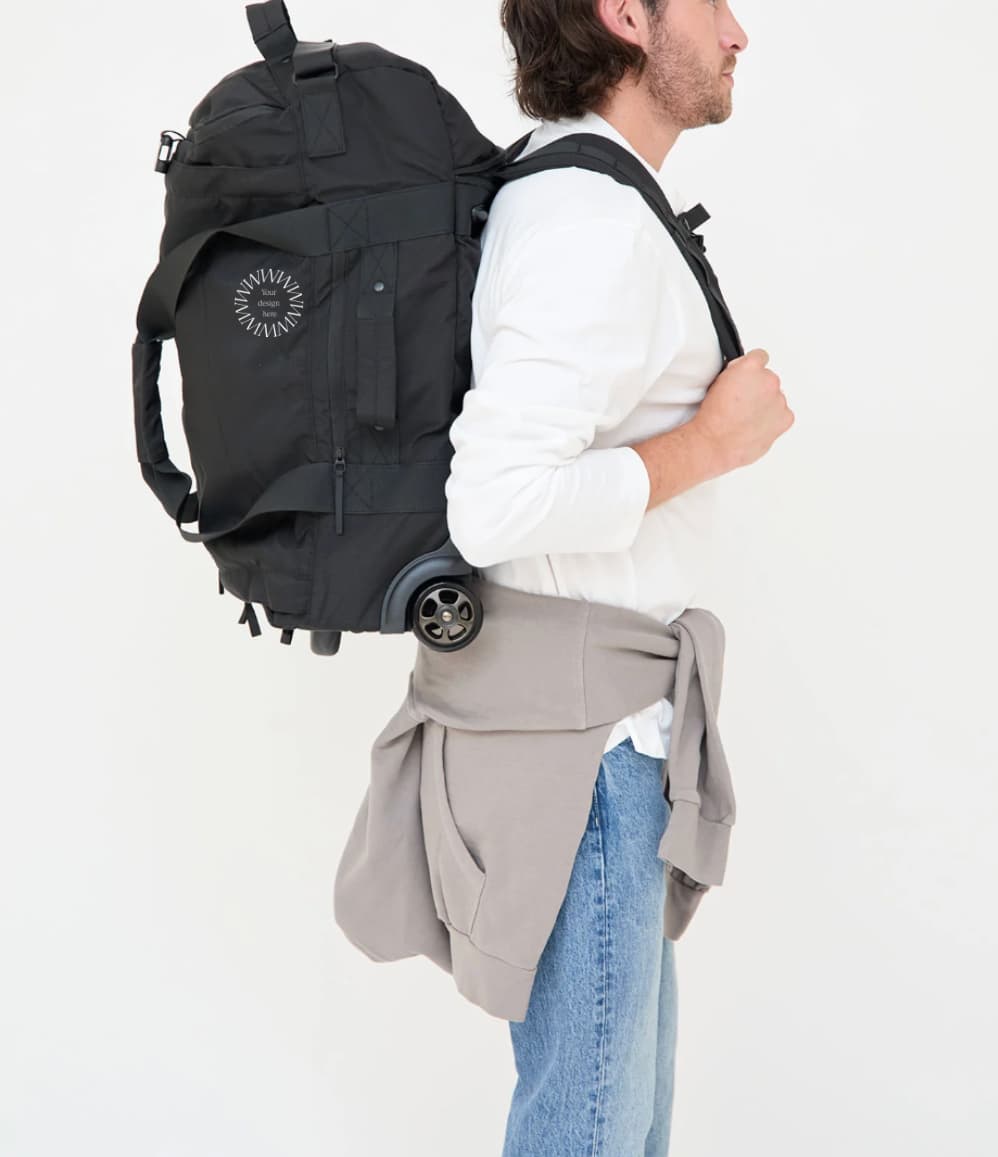 Wheeled Duffel 37L in black, worn