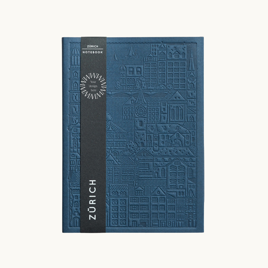 Debossed blue Zurich notebook personalised for corporate events, premium sustainable swag for clients and teams