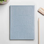 Light blue debossed Zurich notebook personalised for corporate gifting, premium sustainable event swag
