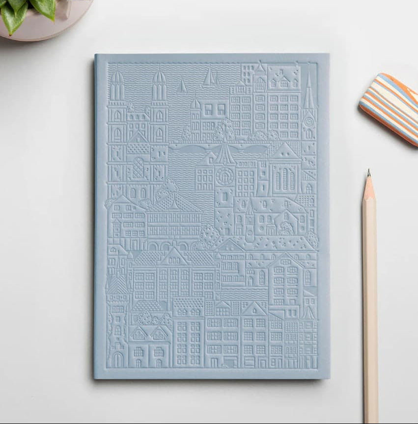 Light blue debossed Zurich notebook personalised for corporate gifting, premium sustainable event swag